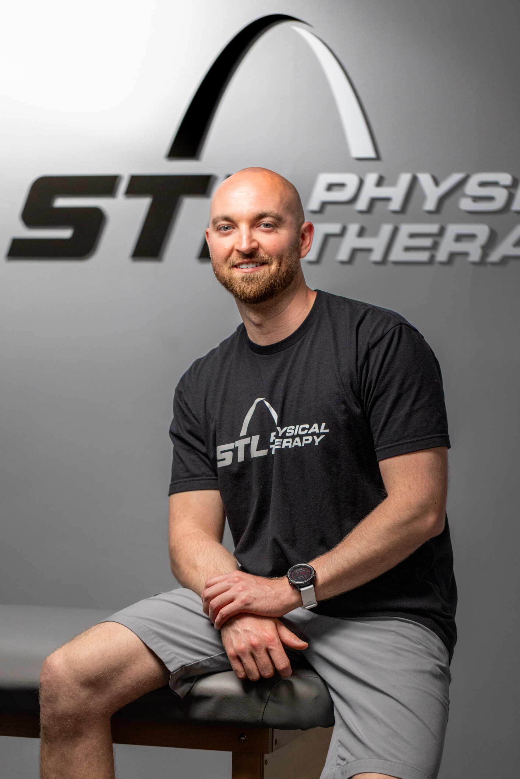 STL Physical Therapy physical therapist seated in the clinic with arms relaxed